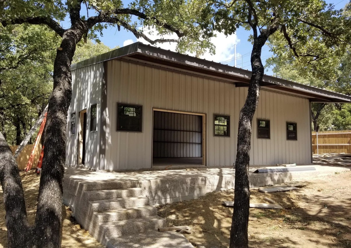 Completed Whit-Tom metal building with covered porch